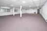Below grade area with a drop ceiling and recessed lighting