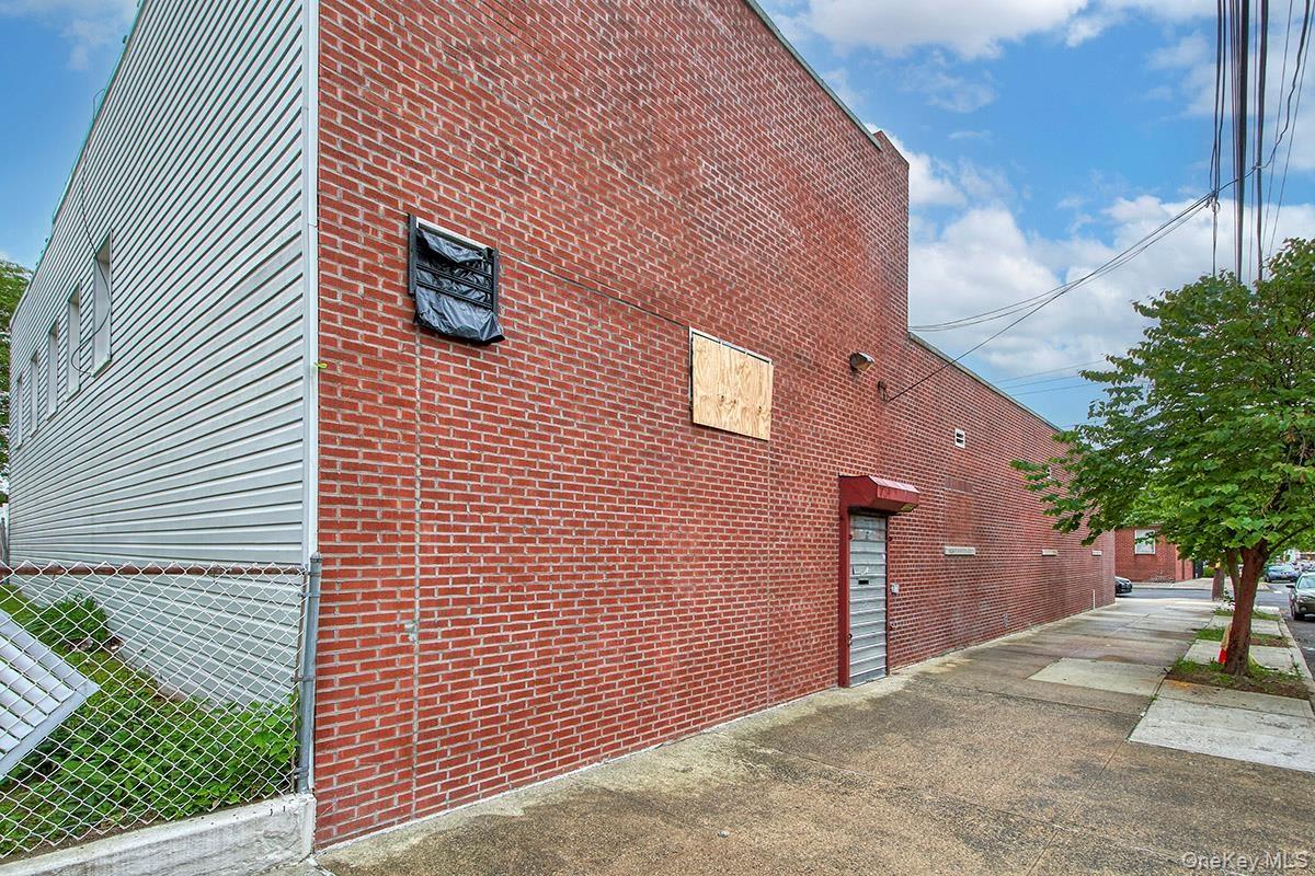 View of side of property with brick siding
