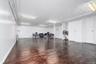Garage featuring baseboards