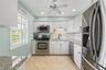 This gorgeous kitchen has plenty of storage and counter space!