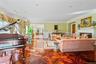 Formal living space featuring parquet wood-finish flooring