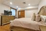Bedroom featuring wood finished floors and recessed lighting