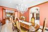 Dining area featuring arched walkways, recessed lighting, ornamental molding, and a chandelier