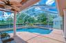 Resort-style saltwater PebbleTec pool — all yours