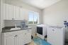 Laundry room with large pantry to left of picture off kitchen