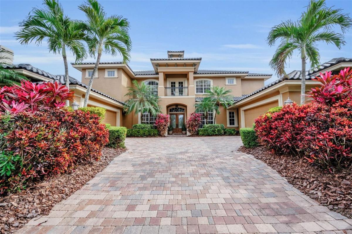 Custom Built Mediterranean Revival Two story Pool Home in the Bayou Club!