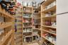Hidden Pantry with second Fridge & Freezer.