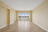 Open-concept living room with tile flooring