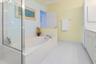 Primary Bath with separate tub, dual vanity and shower.