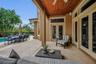 Overlooks the spa-inspired pool and lush tropical landscaping for a true resort ambiance