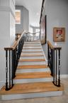 Stairs leading to the second floor (Upper level)