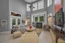 Soaring, two story volume ceiling with a wall of windows!