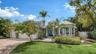 Front elevation of this coastal contemporary designed home