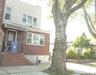 House located on a desirable residential tree lined street.  73rd St Between Myrtle Ave And Cooper St . Bus on corner of Myrtle Ave And 73rd St, The t