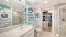 Full main bath with additional upgraded shelves