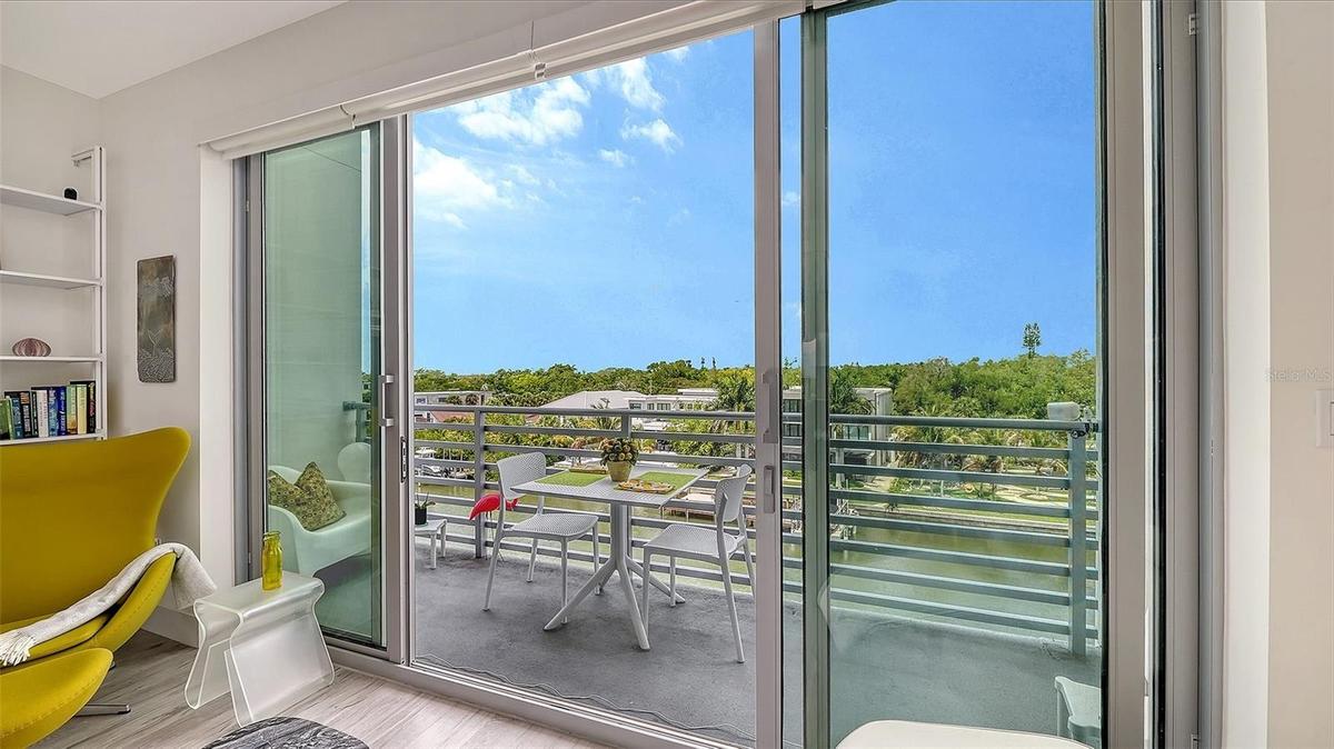 Gorgeous view of water, Whitaker Bayou leading out to Sarasota Bay, overlooking your private porch, from kitchen/living area