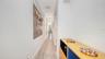 Spacious entrance area to make your own with artwork and your credenza