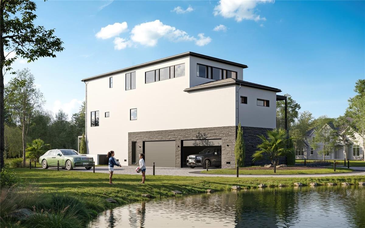 Expansive 4 car garage with direct access to elevator that services all levels.