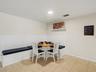Dining area with built-in bench and storage