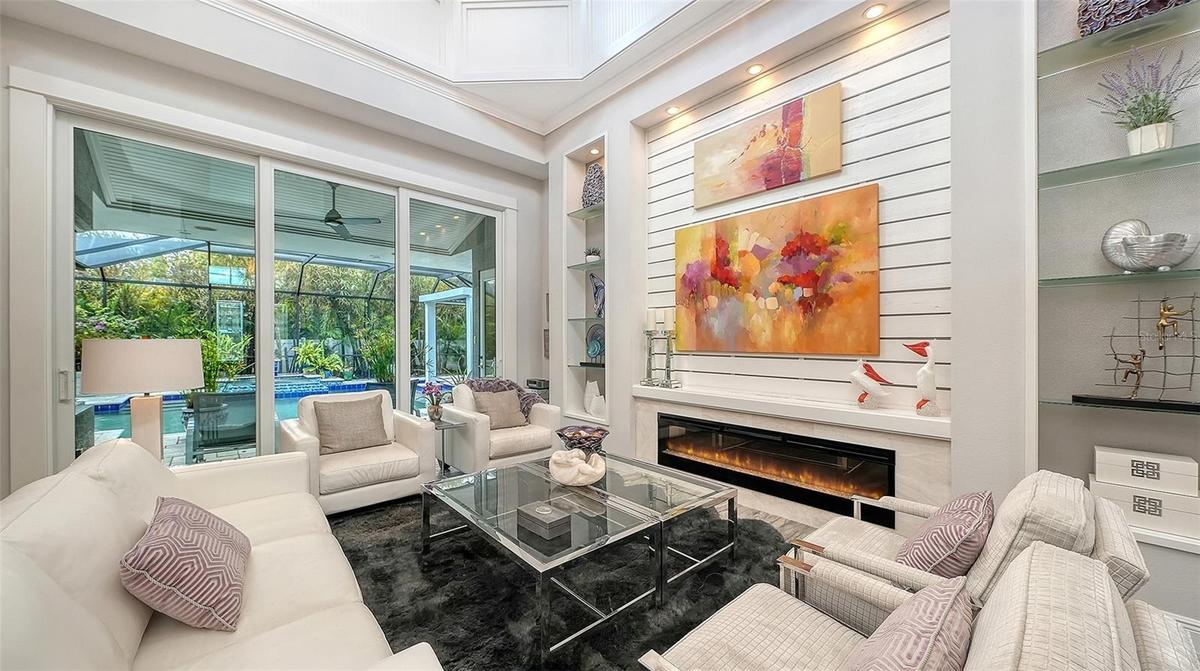 Imagine sitting here at night with the fireplace flickering, listening to the sound of the waterfall into the pool
