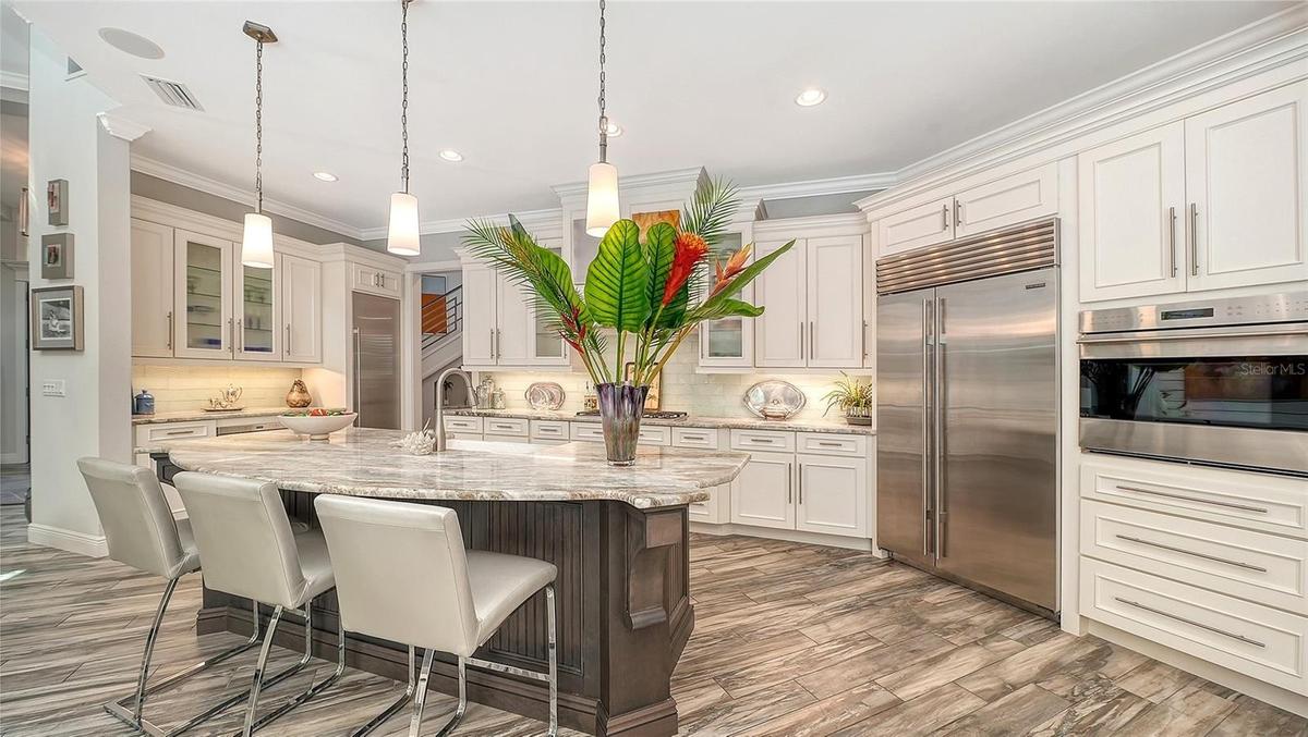 The perfect home for entertaining guests around the kitchen
