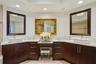 Elegant Primary Bathroom Retreat with dual vanities and timeless touch of sophistication