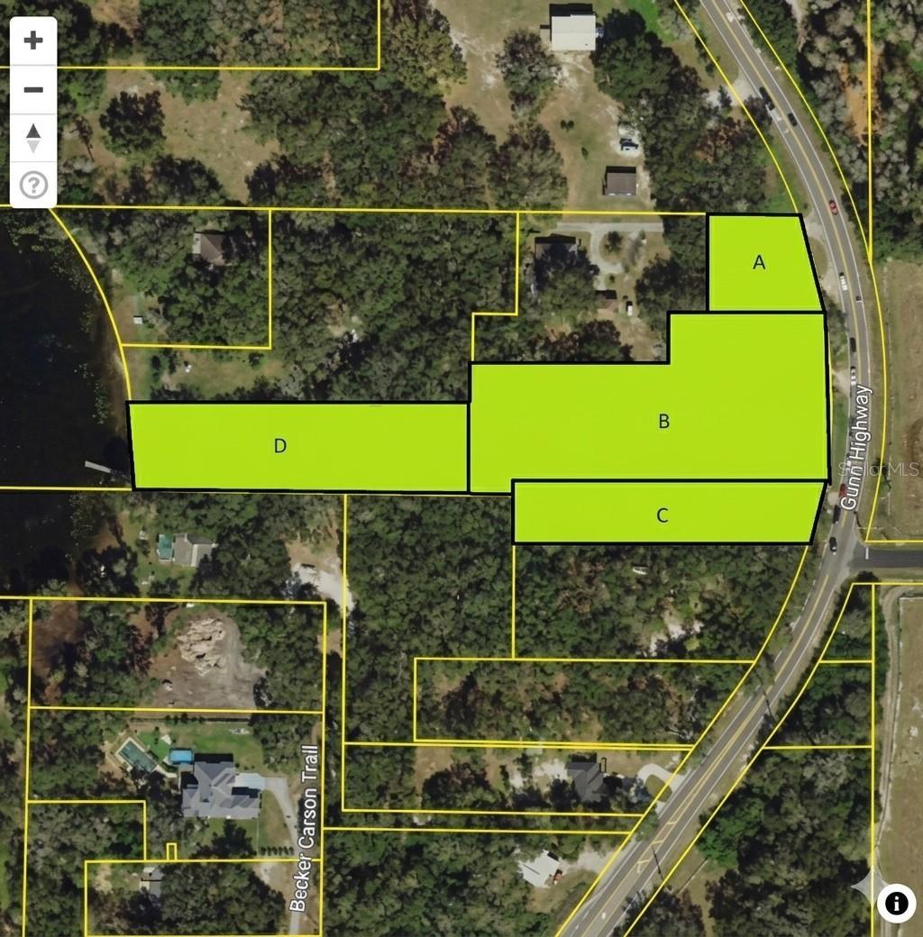 Lake Frontage Single Family Home adjacent to 3 additional parcels currently Tampa Bay Nursery on Gunn Highway