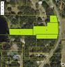 Lake Frontage Single Family Home adjacent to 3 additional parcels currently Tampa Bay Nursery on Gunn Highway