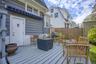 Expansive outdoor deck with slatted wood flooring