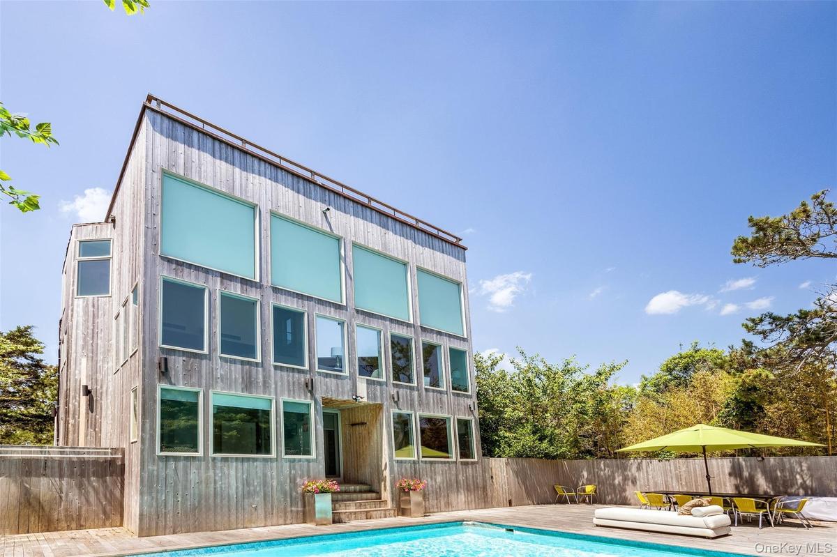 Rear view of property with a patio area