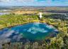 Single Family home on Lake Raleigh. Appx 18 Acre Spring Fed Lake