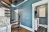 Staircase to the window's walk.  Door to the laundry is open to the left.