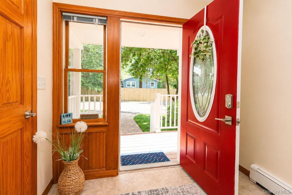 Bright red door welcomes you into this special home!