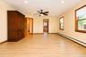 Primary bedroom with wonderful natural sunlight and hardwood floors~
