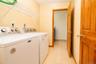 The utility room  is accessible from the laundry room~