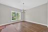 Sun-filled with hardwood flooring.