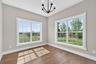 Sunny with views and hardwood flooring.