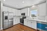 42" cabinets and counter space with high hat lights.