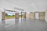 Gleaming epoxy flooring in garage.