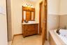 Lovely primary bathroom with walk-in closet, soaking tub, large tiled shower and private commode~