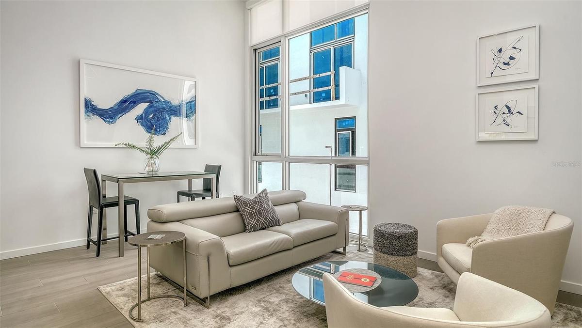 Modern one-bedroom, one-bath pied-a-terre residence designed for a connected, active urban lifestyle
