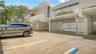 Spacious gated courtyard with secure entry off 4th Way.