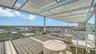 Two shaded rooftop lounge areas for relaxation and social gatherings.
