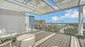 Two shaded rooftop lounge areas for relaxation and social gatherings
