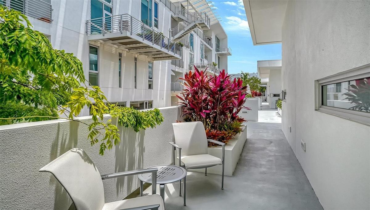 Small private patio near the front entry, ideal for enjoying Florida’s year-round outdoor lifestyle.