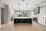 The heart of the home is the chef’s kitchen, thoughtfully designed for entertaining and everyday enjoyment.