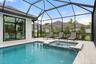 The spa flows seamlessly into the pool.