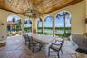 COVERED DINING AT ITS BEST WITH WATER AND POOL VIEWS