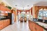 Seamless connection to great room and dining areas.