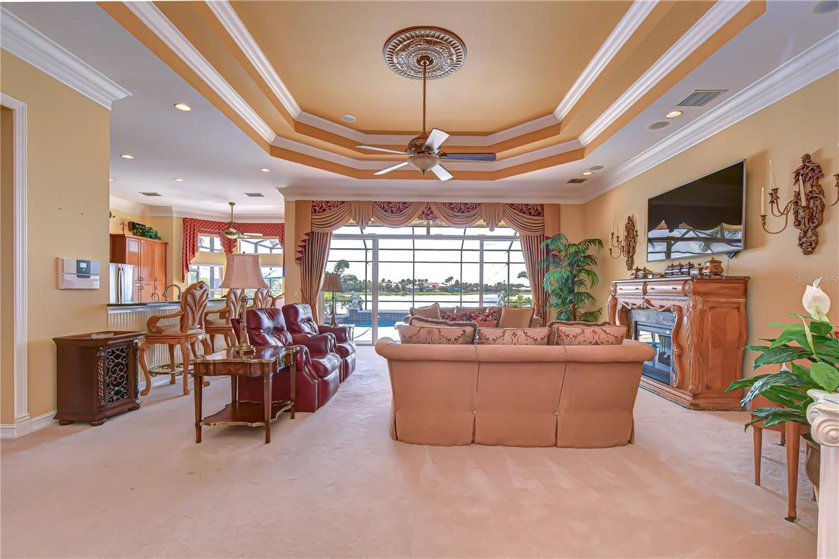 Grand entrance with immediate views of the lake and lanai.